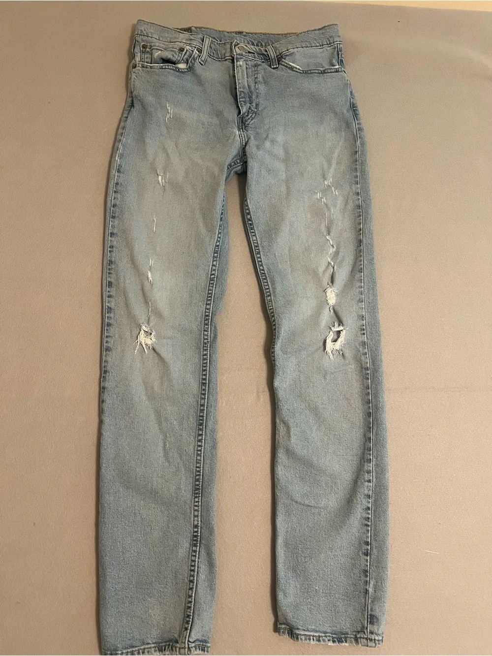 Levi's Light Blue Slim Straight Distressed Jeans